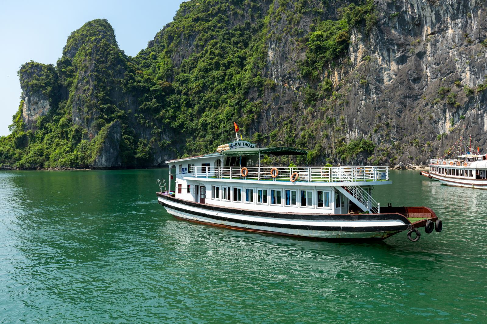 Tour from Hanoi to Halong Bay with wooden/iron boat experience