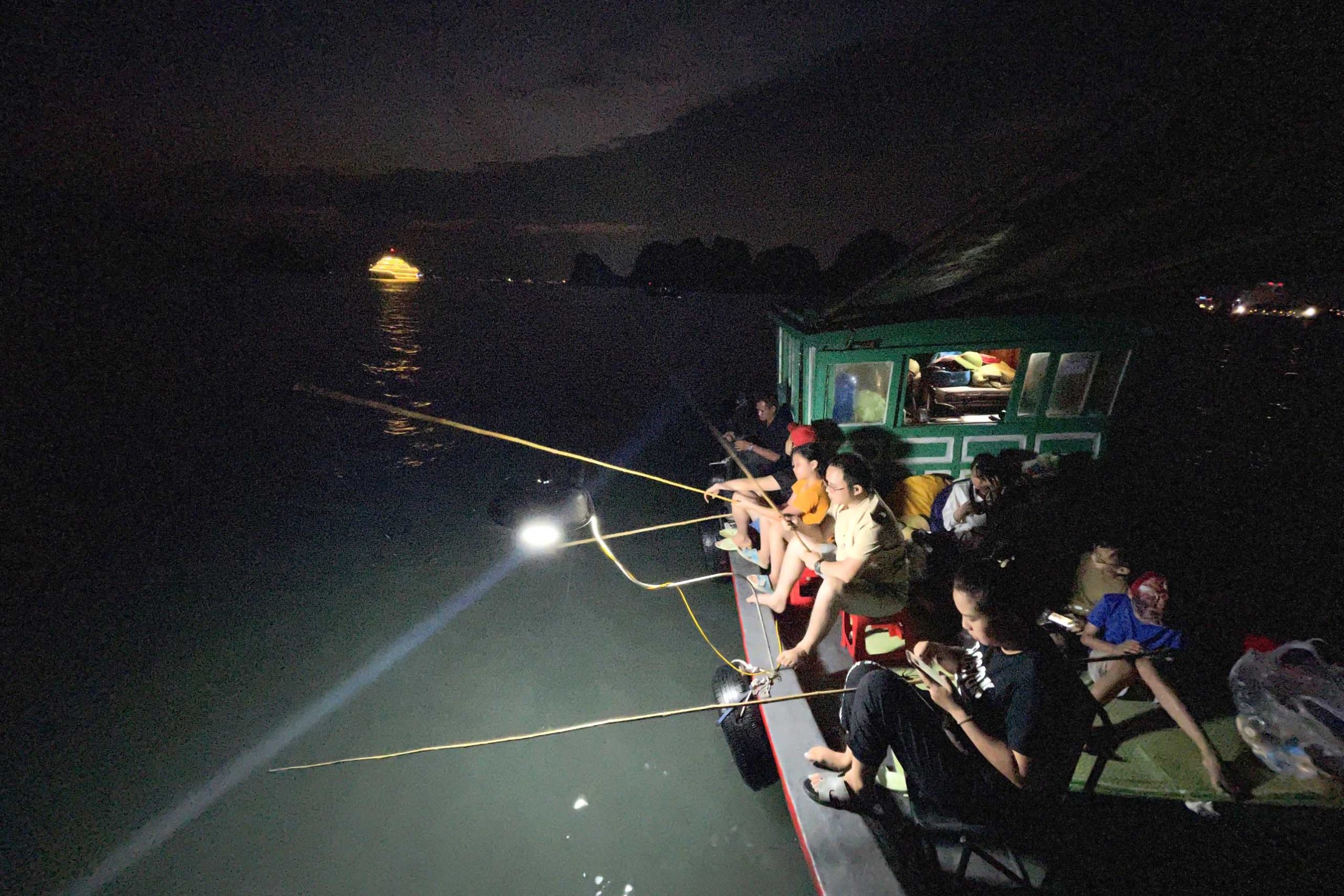Try squid fishing at night.